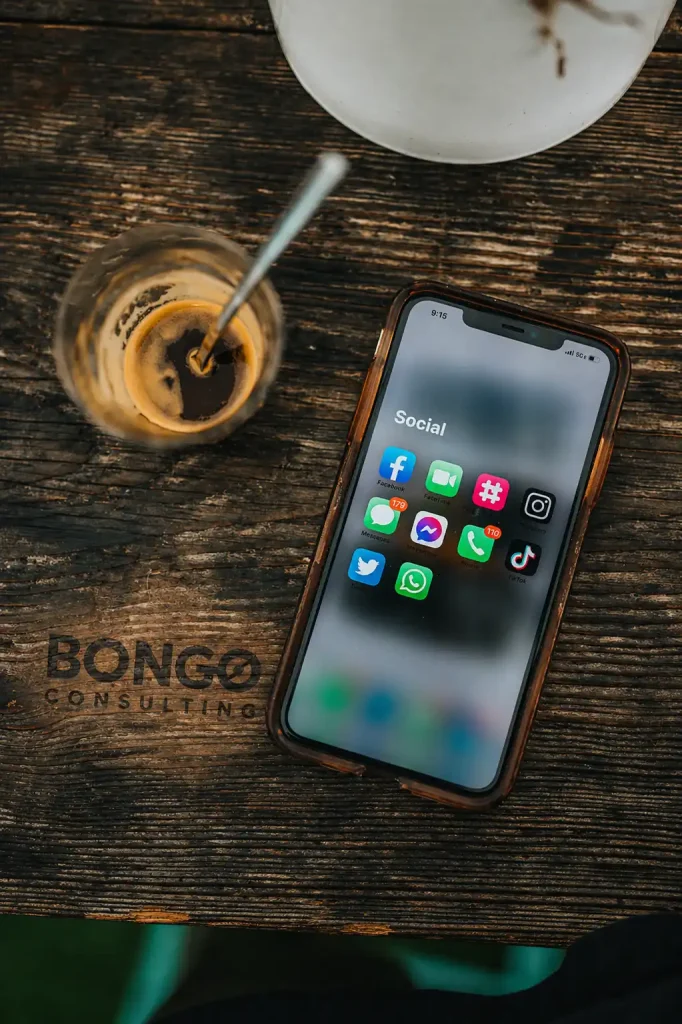 Brown table with coffee and smartphone on top