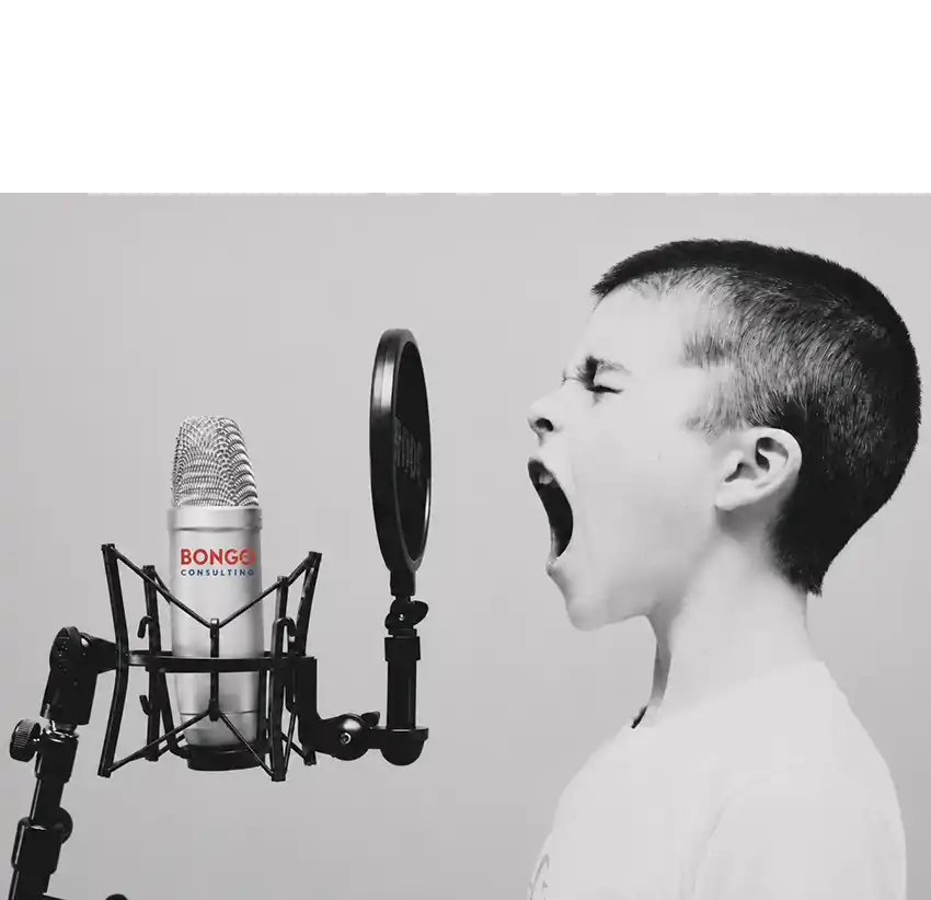 Kid yelling into microphone with Bongo logo